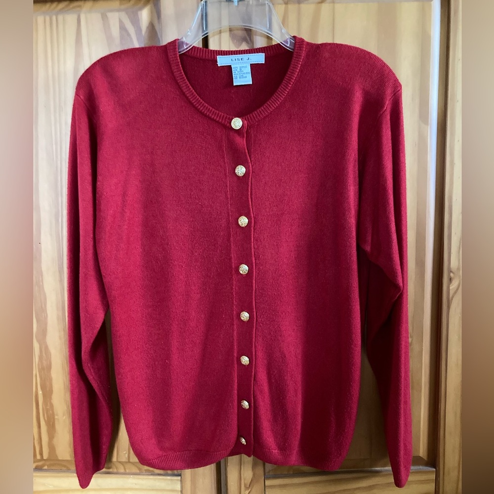 Long sleeve red cardigan.Gold buttons:By Lise J. Size Small